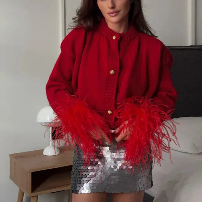 Abrigo ssandra con plumas