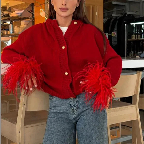 Abrigo ssandra con plumas